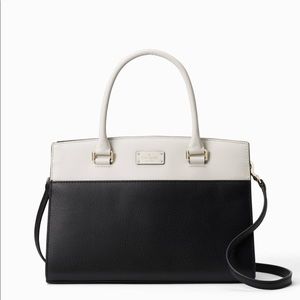 Kate Spade bag “Caley” has tags 10/10. Never used